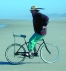 Mike riding backwards on bicycle